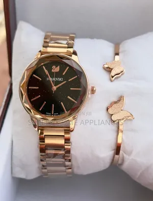 Swarovski Women's Pure Gold Wrist Analog Time Piece With Bracelet