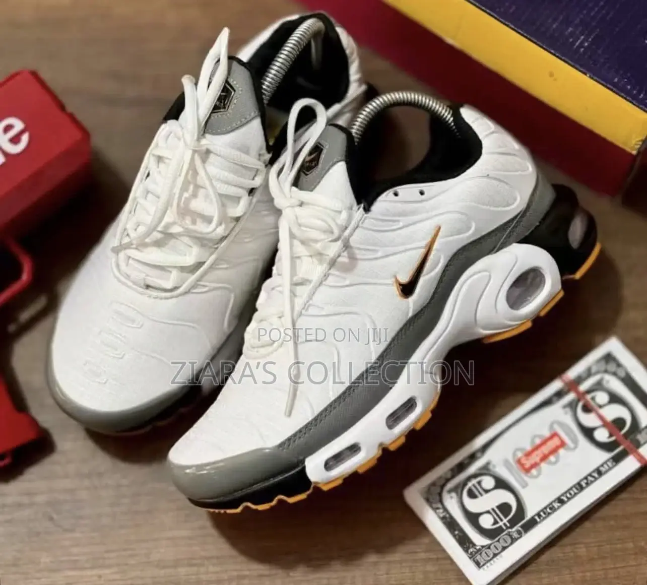 Nike Air Max Plus (Tn) Sneakers In A White,Grey,And Orange Colorways
