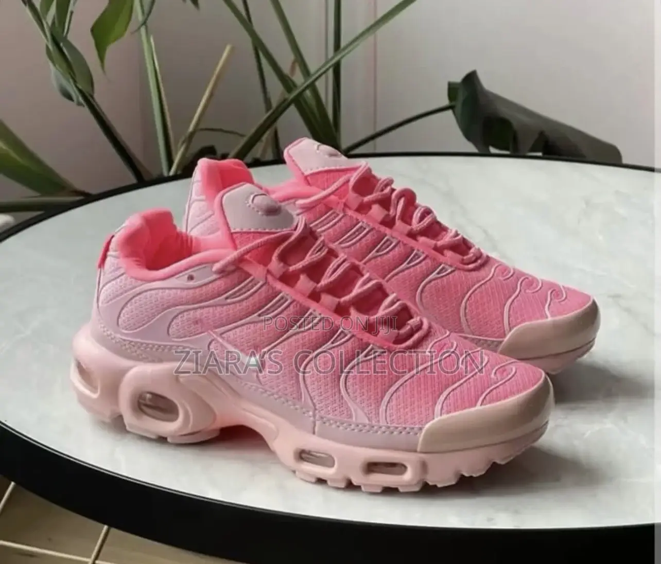 Nike Air Max Plus (Tn) Sneakers In A White,Grey,And Orange Colorways
