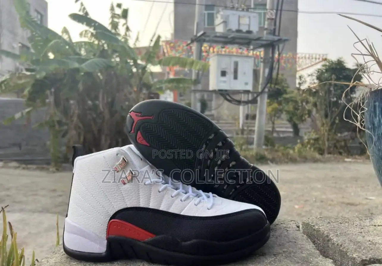 Air Jordan 12 Retro “Taxi Flip “Sneakers