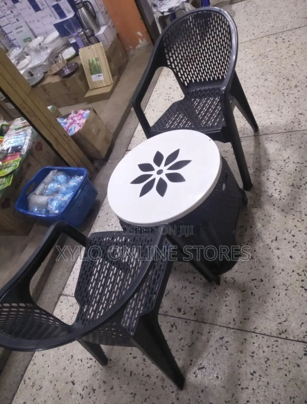 Plastic Outdoor Table and Chair Set Black With a White Top
