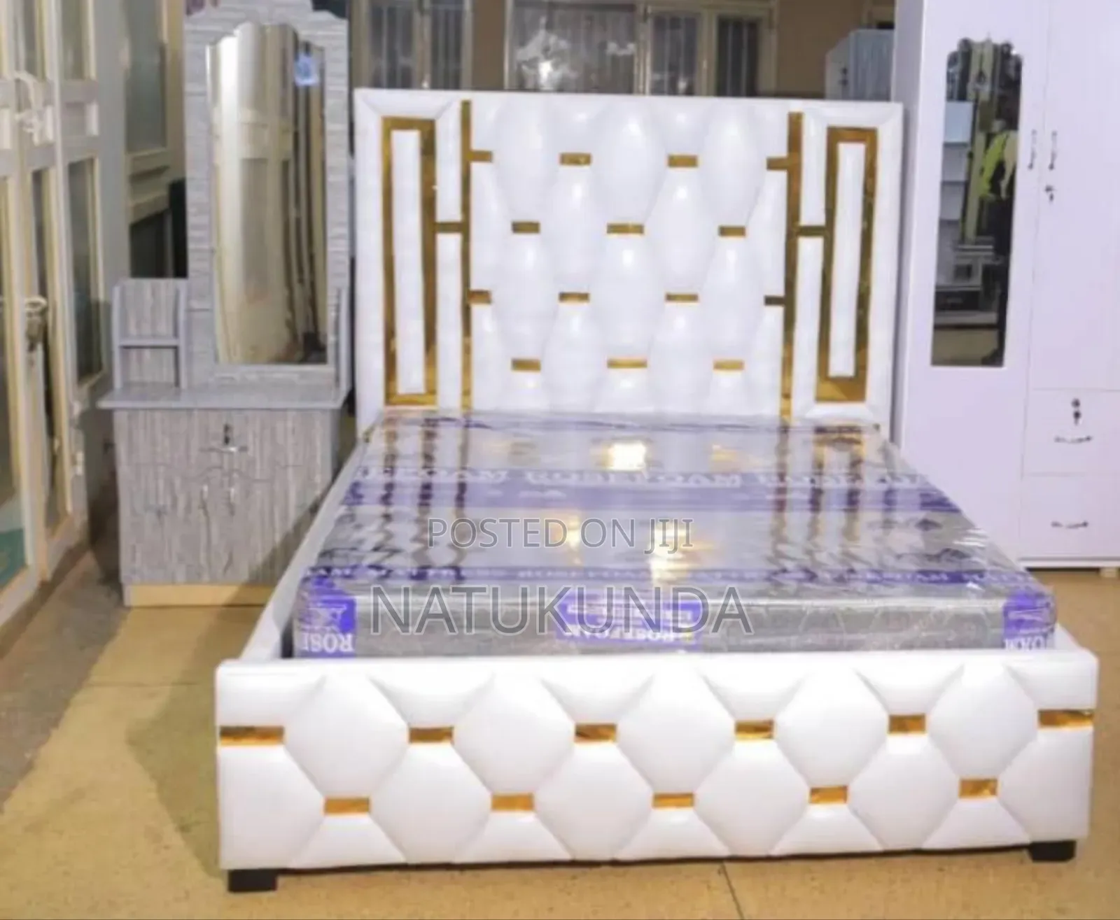 White Bed With Golden Stickers