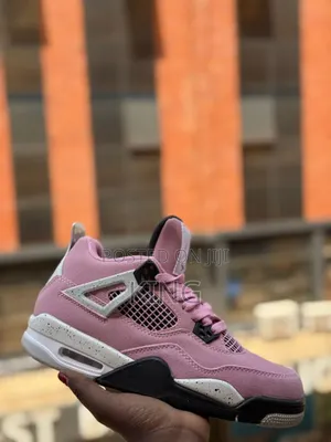 Nike Air Jordan 4 Retro "Orchid" Women's Sneaker.