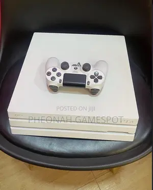 Ps4 Pro Console, 2 Controllers and 31 Games, Stable and Ready to Play.