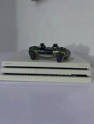 Playstation 4 Pro , 2 Pads and 29 Games, Clean Unit Ready for Action.