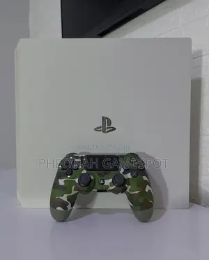 Ps4 Pro Console, 2 Controllers and 28 Games, Quick Startup Every Time.