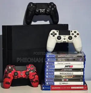 Ps4 Console, 2 Controllers and 10 Games, Clean and Ready to Run.