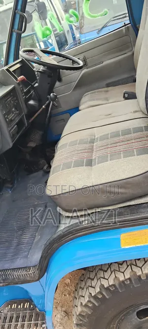 Isuzu Elf Tiper
