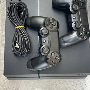 Ps4 With 2 Controllers and 16 Games, Clean System for Daily Fun.