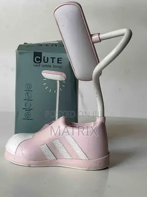 Led Table Lamp With a Flexible Gooseneck and a Base Shaped Like a Shoe