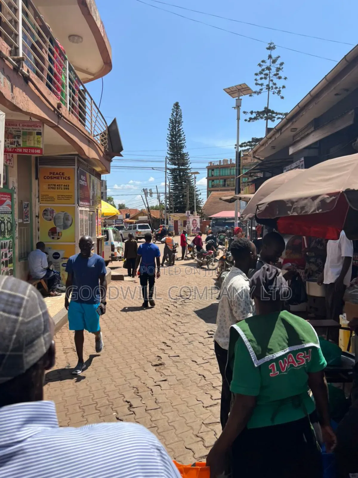100*100feet Plot of Land With Shops in Ntinda on Main Tarmac Road