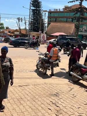 100*100feet Plot of Land With Shops in Ntinda on Main Tarmac Road