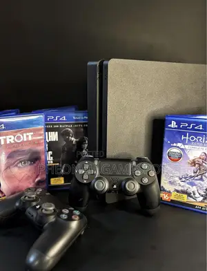 Ps4 Console, Two Controllers and 14 Games Installed, Family Friendly.