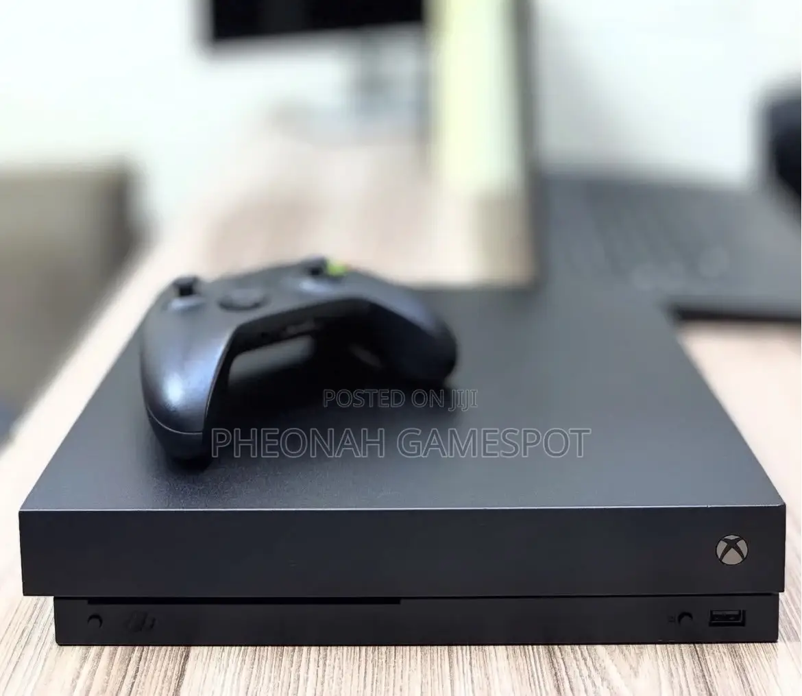Premium Used Xbox One X. 1tb Storage