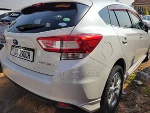 Subaru Impreza 2.0i Limited PZEV 4dr Hatchback AWD (2.0L 4cyl CVT) 2015