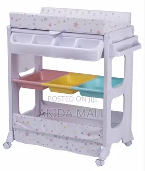 Thekiddoz Changing Table With Bathtub, A Multifunctional Nursery Item