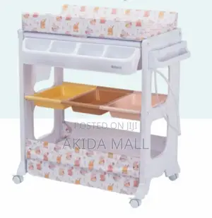 Thekiddoz Changing Table With Bathtub, A Multifunctional Nursery Item