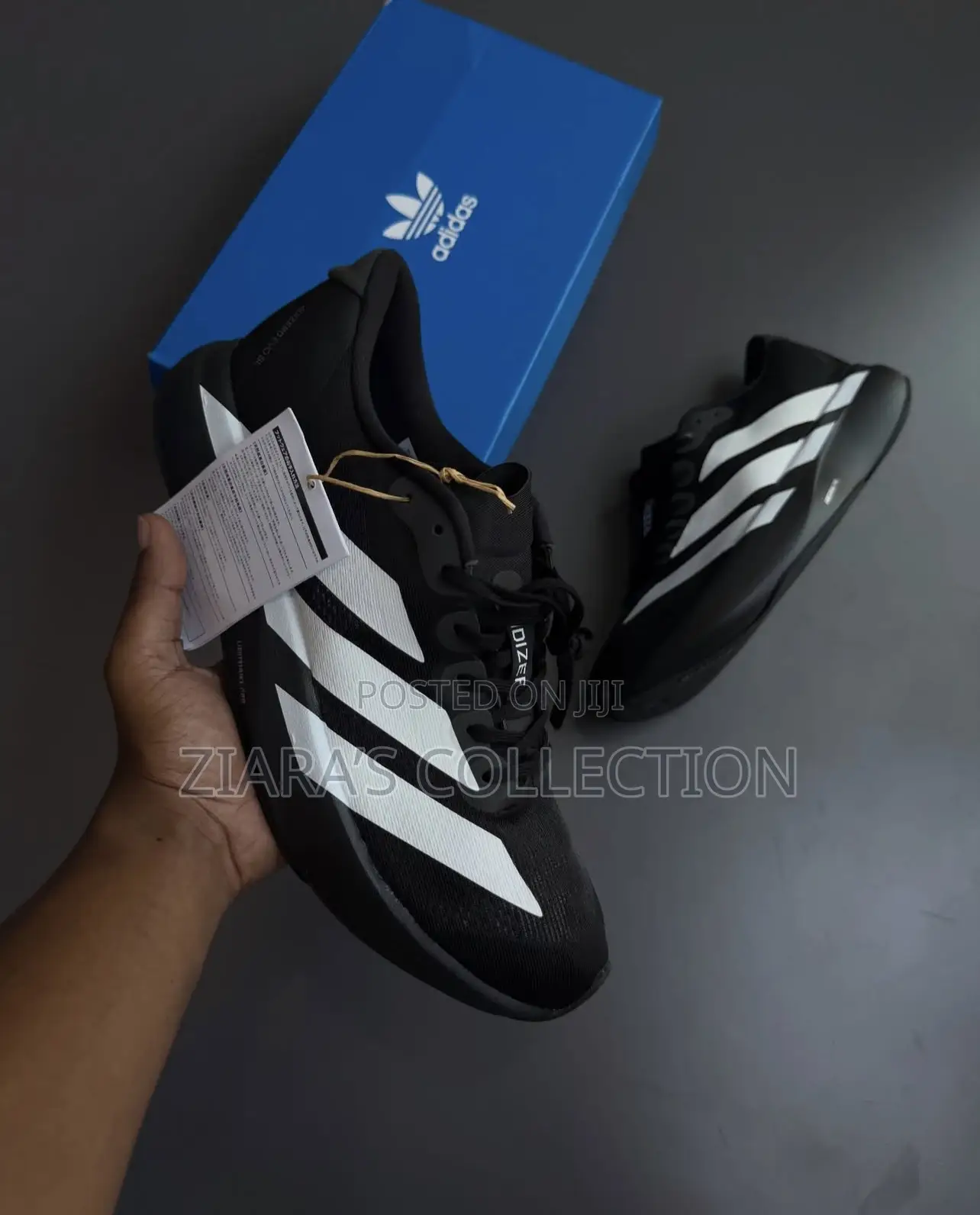 Adidas Adizero Evo Sl Running Shoes In Black And White Colorways