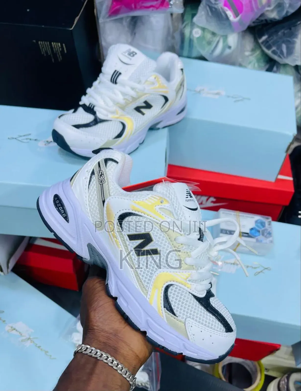 New Balance 530 Sneaker. Black, Pink, White, Yellow