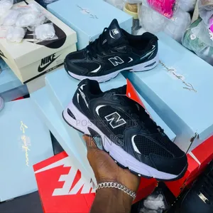 New Balance 530 Sneaker. Black, Pink, White, Yellow