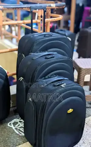 A Set of Four Suitcases