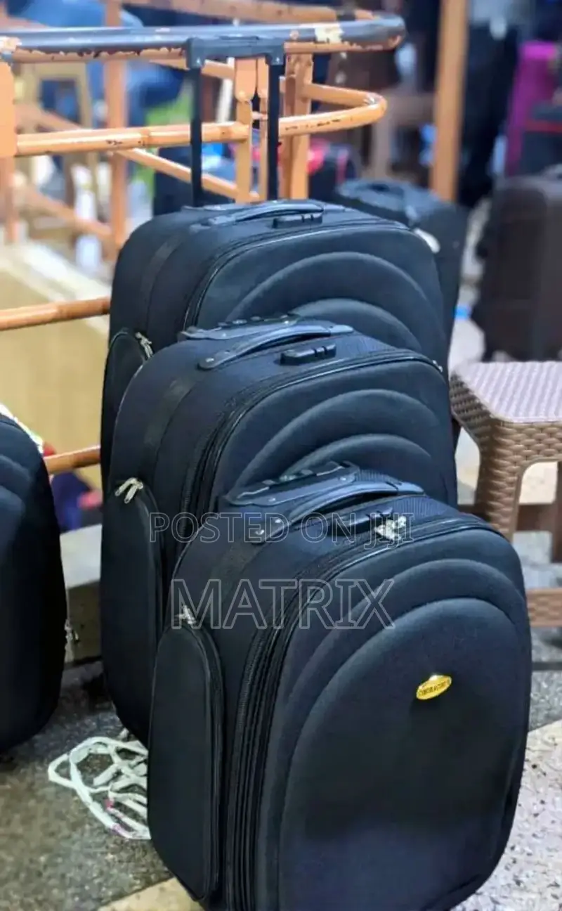 A Set of Four Suitcases