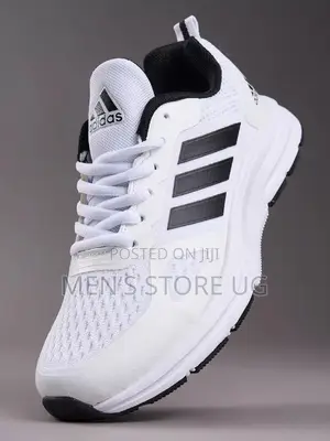 Didas Duramo 10 Running Shoe In Cloud White And Core Black Colors.