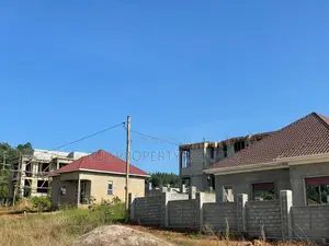 Land With Title After Akright - Entebbe