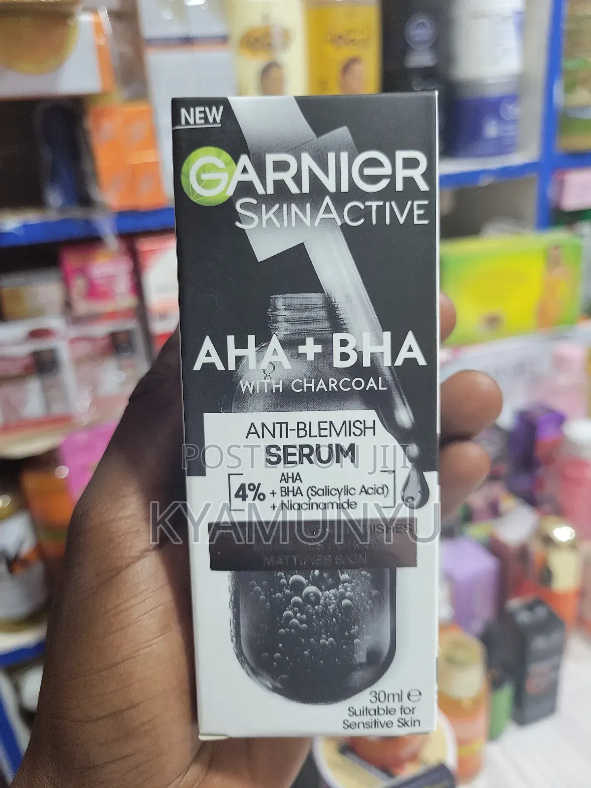 Garnier Skinactive Aha + Bha Charcoal Anti-Blemish Serum.