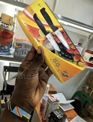 A Dozen of Small Kitchen Knives With Black Handles