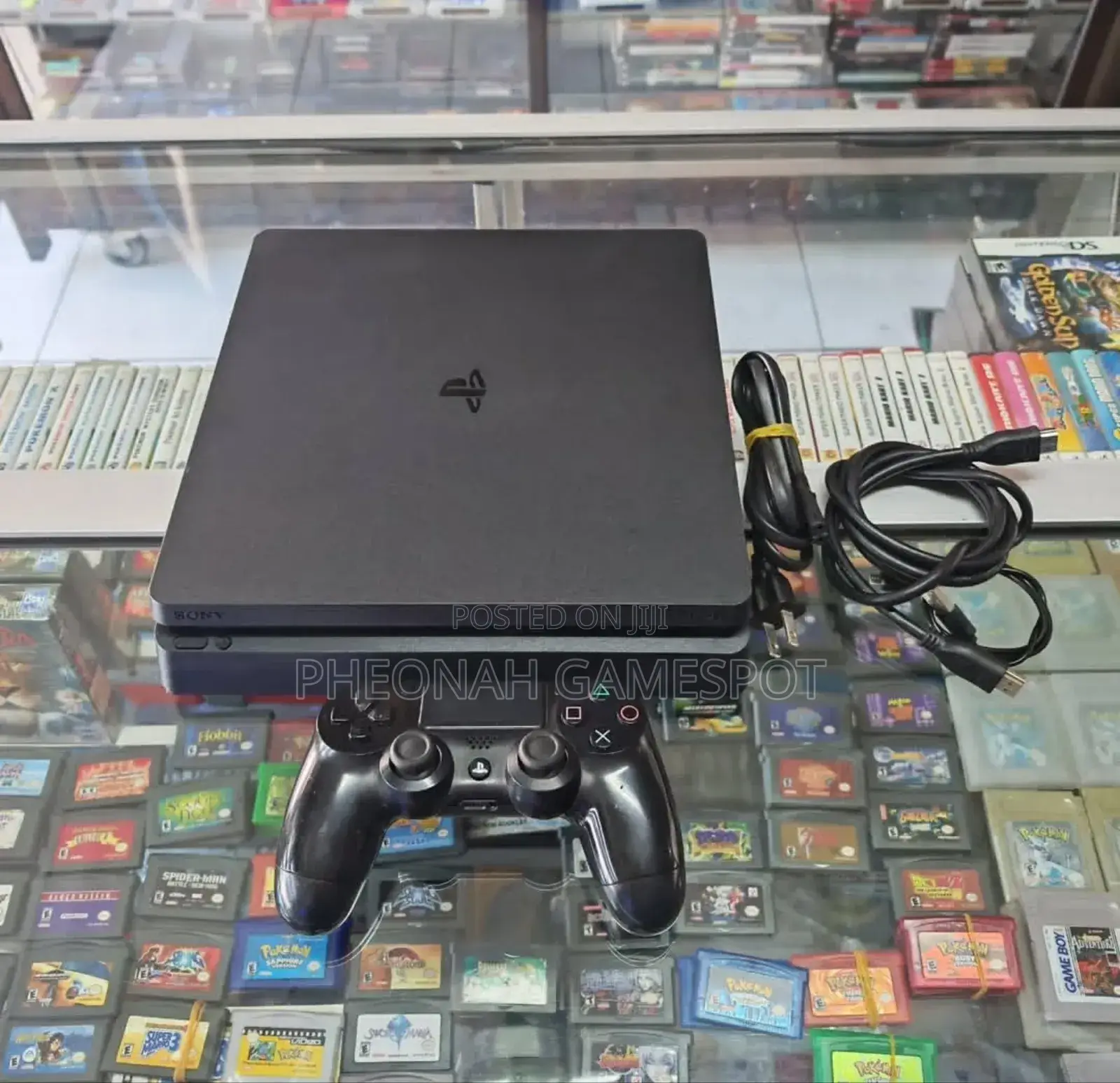 Used Sony Playstation 4 Slim. A Ps4 Slim, 14 Games, Two Controllers