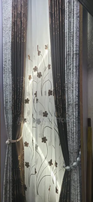Brown Curtains and Matching Nets Per Metre