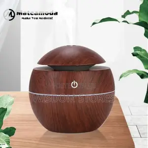 Ultrasonic Aroma Humidifier With Color-changing Led Lights.