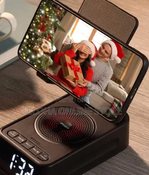 Phone Stand With Wireless Speaker And Alarm Clock.