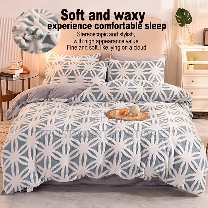 4piece Tufted Fleece Duvets 5by6, 2 Pillowcases, 1bedsheet and 1 Duvet