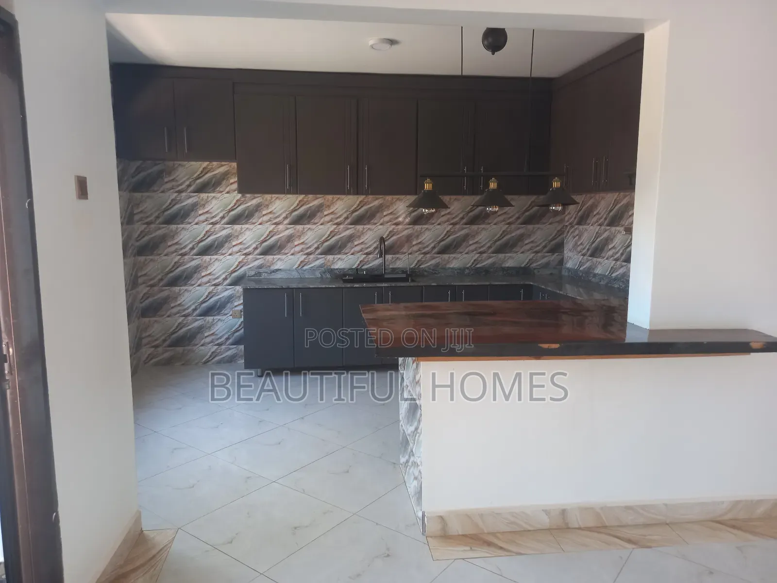 Furnished 4bdrm Bungalow in Kira for sale