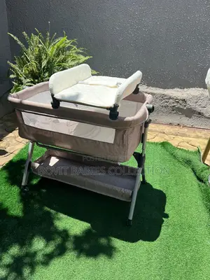 Multifunction Bedside Baby Crib Bed With a Diaper Changer.