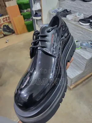 Black Patent Leather Lug Sole Derby Shoes.