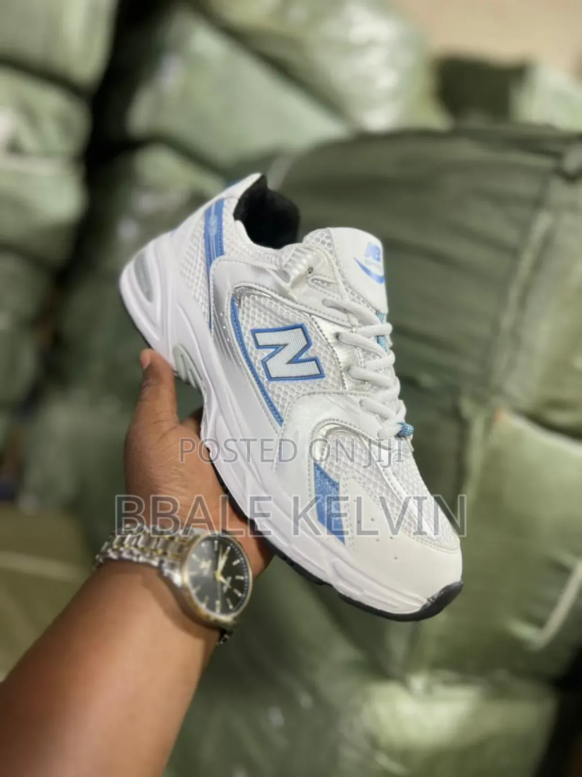 New Balance 530 Sneaker in White With Light Blue and Silver Accents