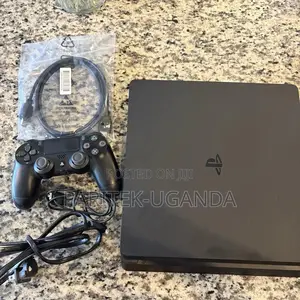 Playstation 4 Beside 1 Controller.