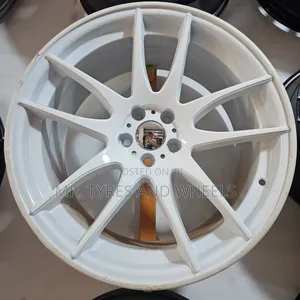 Size 18 Rims in a Gd Disney and in a White Color and Its Offset Rims.
