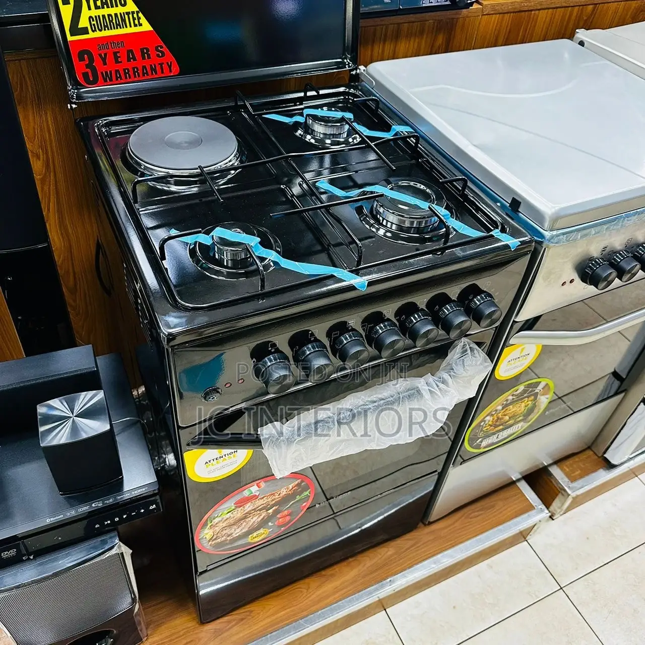 50 by 50 Blue Flame Cooker 3 by 1 With Electric Oven at *700,000* Ugx