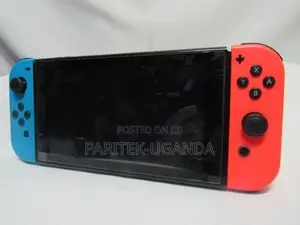 Nintendo Switch Handheld Console W/Neon Red Blue Joy-Cons Hac-001(-0