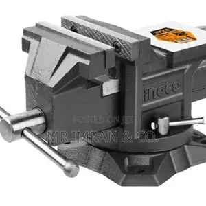 Heavy-duty Bench Vise With A Swivel Base And Anvil.