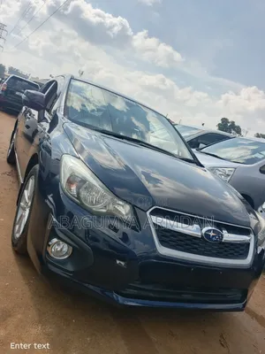 Subaru Impreza 2.0i Limited PZEV 4dr Hatchback AWD (2.0L 4cyl CVT) 2014 Black