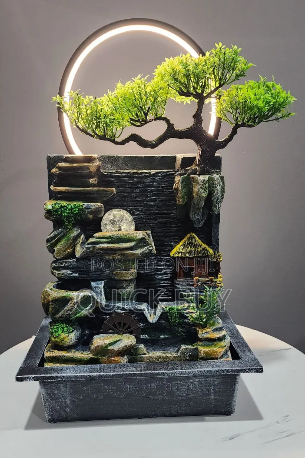 Tabletop Water Fountain With an Artificial Bonsai Tree Design