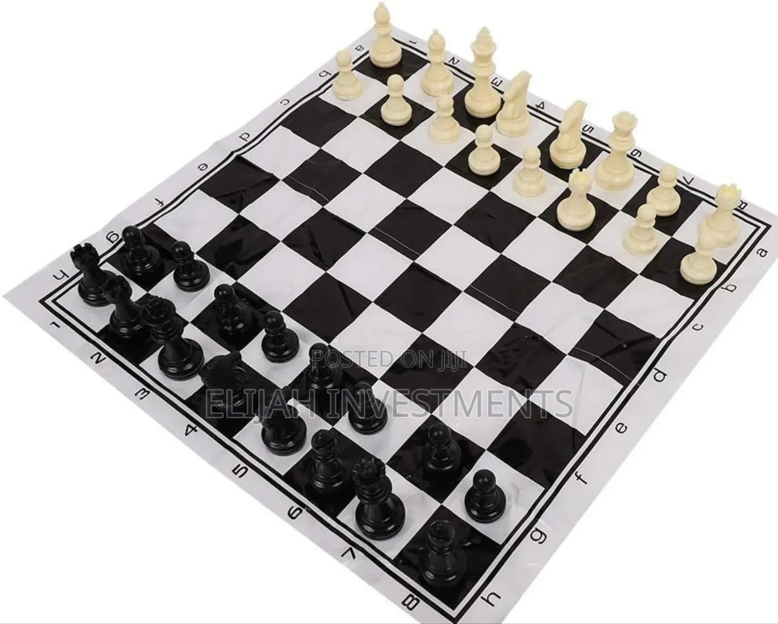 Portable Roll-Up Chess Set With Plastic Pieces.