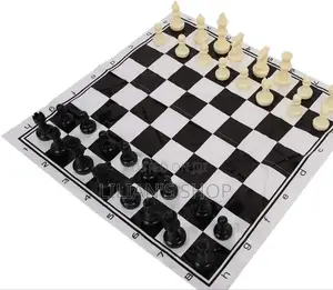 Portable Roll-Up Chess Set With Plastic Pieces.