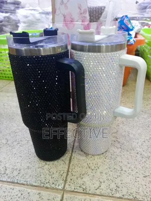 40 Oz Rhinestone-Studded Stainless Tumbler With a Handle and Straw.