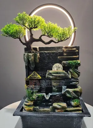 Tabletop Water Fountain With an Artificial Bonsai Tree Design